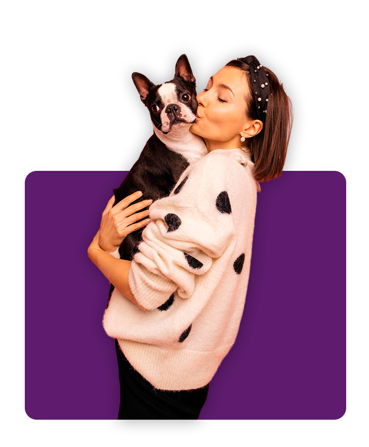 Tutora abraçando cachorro - FAQ Cartão Amigão